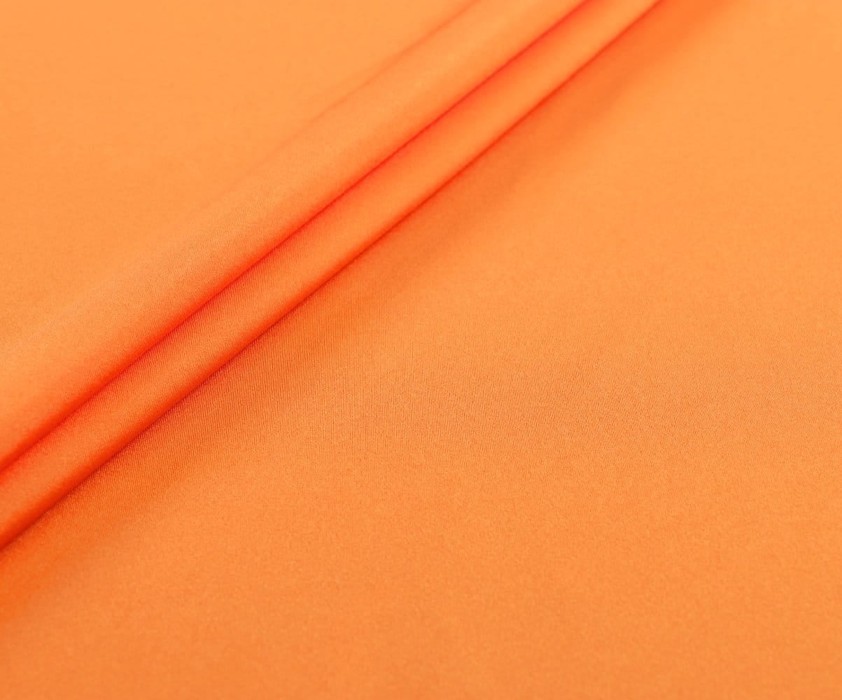 #204 Smooth vibrant orange fabric folded diagonally