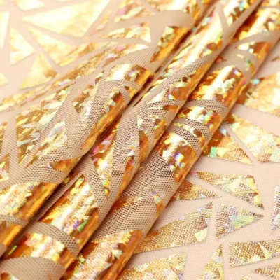 Abstract metallic foil mesh in nude and gold — wholesale stretch fabric