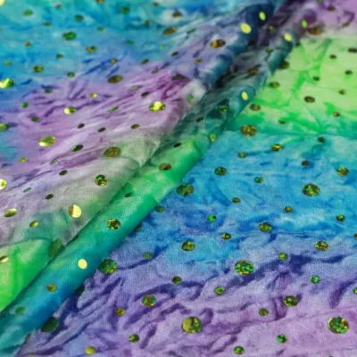 Tie dye sequins stretch velvet in green, turquoise, and orchid — wholesale fabric