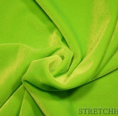 Plain stretch velvet in neon green — wholesale fabric