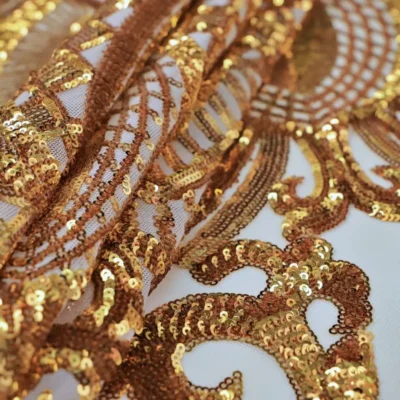 Designer sequins mesh spandex in gold and nude — wholesale stretch fabric