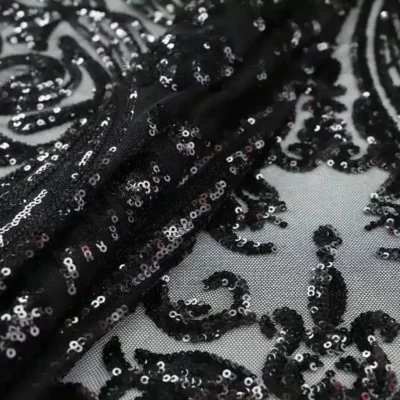 Designer sequins mesh spandex in black — wholesale stretch fabric
