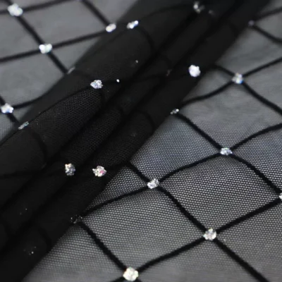 Diamonds mesh spandex flock glitter in black and silver — wholesale fabric