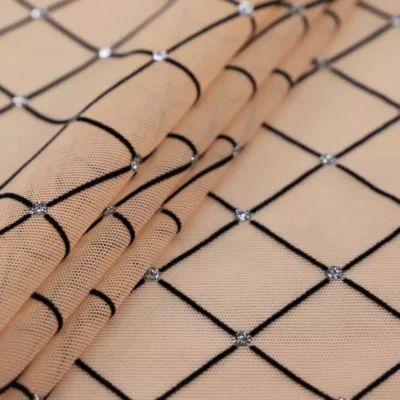 Diamonds mesh spandex flock glitter in nude, black, and silver — wholesale fabric