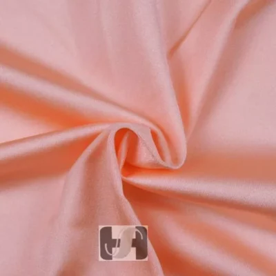 Nylon spandex shiny in light peach — wholesale stretch fabric