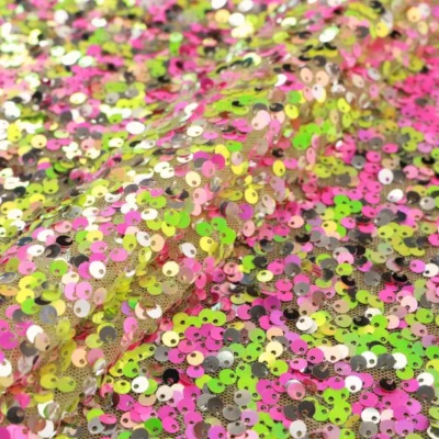 Designer sequins polyester mesh in lemonade and hot pink — wholesale fabric