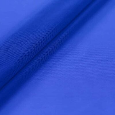 Close-up of folded royal blue woven fabric texture