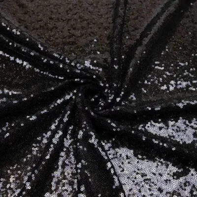 Black glitz starlight sequins fabric — wholesale fabric