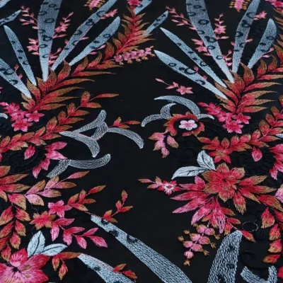 Multi color floral embroidered black tulle mesh — wholesale fabric