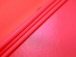 Neon pink fluorescent pin dot spandex — wholesale stretch fabric