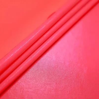 Neon pink fluorescent pin dot spandex — wholesale stretch fabric