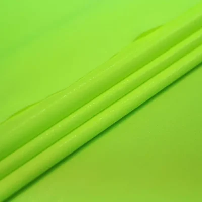 Chartreuse fluorescent pin dot spandex — wholesale stretch fabric