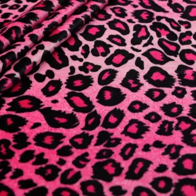 Leopard printed spandex velvet in neon pink and black — wholesale fabric