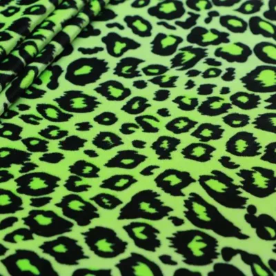 Leopard printed spandex velvet in neon green and black — wholesale fabric