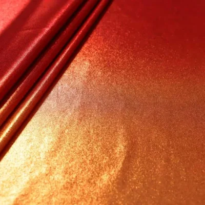 Ombre Pin Dot Metallic Spandex Red Persimmon Copper — Wholesale Metallic Stretch Fabric | Stretch House