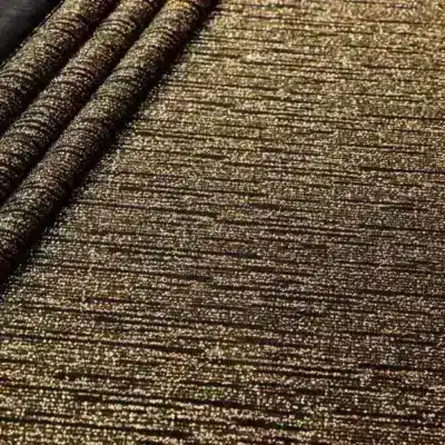 Lurex slinky rain fall spandex in black and gold — wholesale fabric