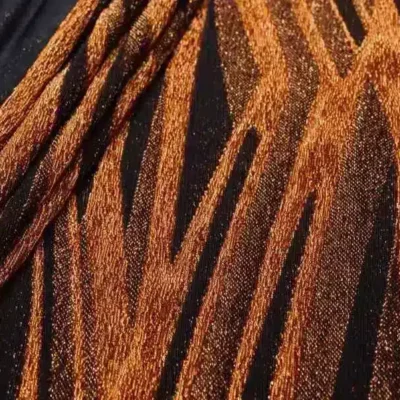 Lurex slinky spandex in black and copper — wholesale stretch fabric