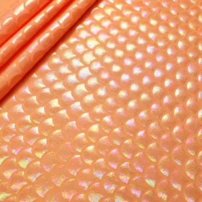 Holographic mermaid fabric in neon orange — wholesale stretch fabric
