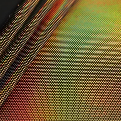 Dizzy foil dot velvet spandex in black and gold — wholesale stretch fabric