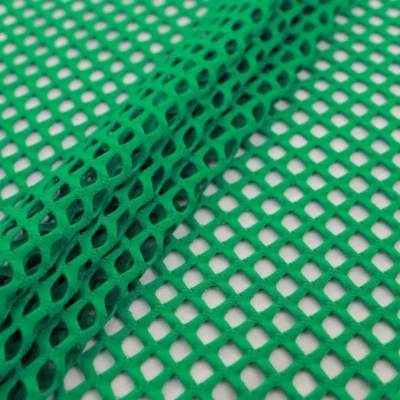 Fish net spandex fabric in kelly green — wholesale stretch fabric