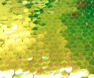 Lime Green Iridescent Teardrop Paillette Sequins18mm on Lime Mesh Fabric #25 — spandex fabric by the yard | Stretch House