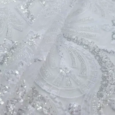 Beaded lace embroidery tulle sequin in white — wholesale fabric