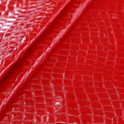 Gator spandex vinyl in red — wholesale stretch fabric