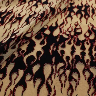 Flame flocking mesh glitter spandex in red, black, and nude — wholesale fabric