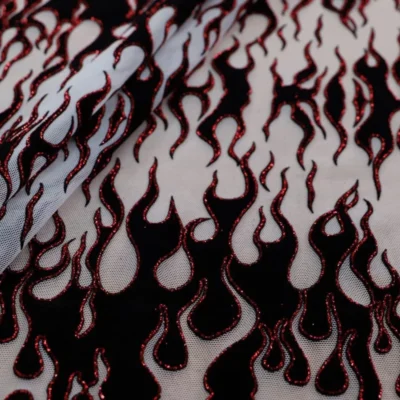 Flame flocking mesh glitter spandex in red, black, and white — wholesale fabric