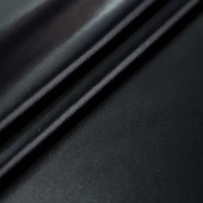 Luminous liquid vinyl coated spandex in black — wholesale stretch fabric