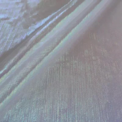Sheer iridescent fabric in opalite white — wholesale stretch fabric
