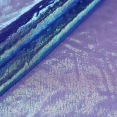 Sheer iridescent fabric in opalite peacock — wholesale stretch fabric