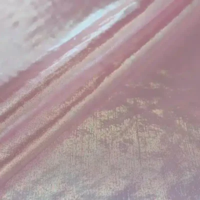 Sheer iridescent fabric in opalite pink — wholesale stretch fabric