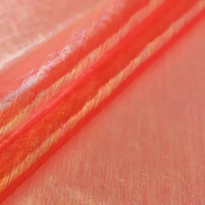 Sheer iridescent fabric in opalite orange — wholesale stretch fabric