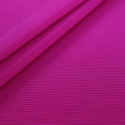 Ribbed performance fabric in fuchsia — wholesale activewear fabric