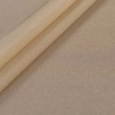 Glissenette shiny spandex in light nude — wholesale stretch fabric