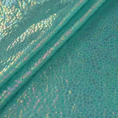 Shattered glass oil slick foil spandex in mint — wholesale stretch fabric