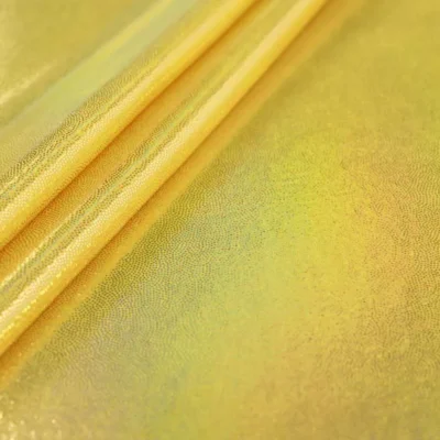 Dizzy holographic spandex in gold and yellow — wholesale stretch fabric