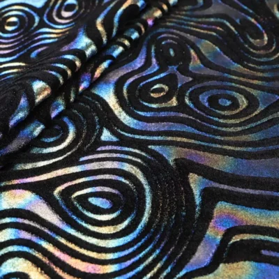 Intricate folds velvet stretch foil in black oil slick — wholesale fabric
