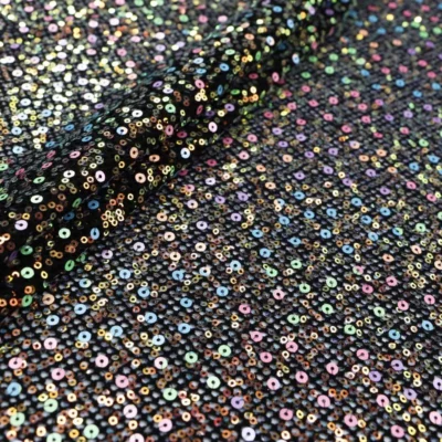 Vogue sequin stretch mesh iridescent white and black — wholesale fabric