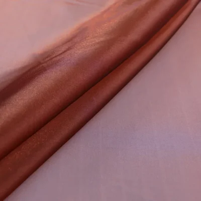 Iridescent crystal nylon spandex in red — wholesale stretch fabric