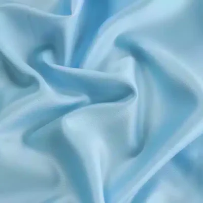 Crepe Satin Polyester Light Blue #5 — spandex fabric by the yard | Stretch House