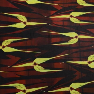Bold yellow floral print fabric on dark red background