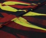 Colorful abstract printed fabric with red black yellow pattern