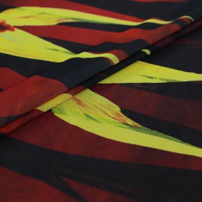 Colorful abstract printed fabric with red black yellow pattern